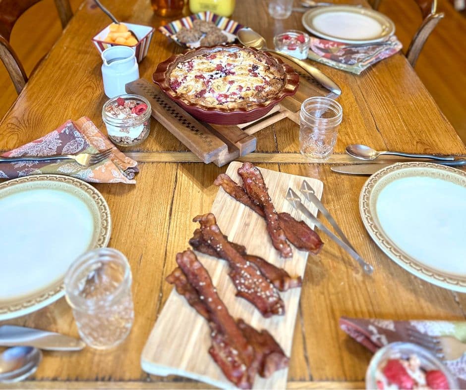 Table with Breakfast Foods and Settings