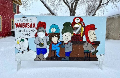 Cartoon-style painted sign for the Wabasha Grumpy Old Man Fest